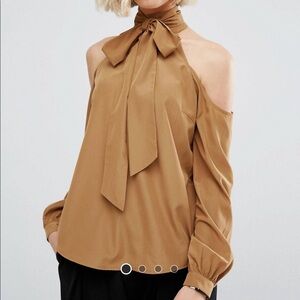 Cold shoulder top with high ribbon tie neck